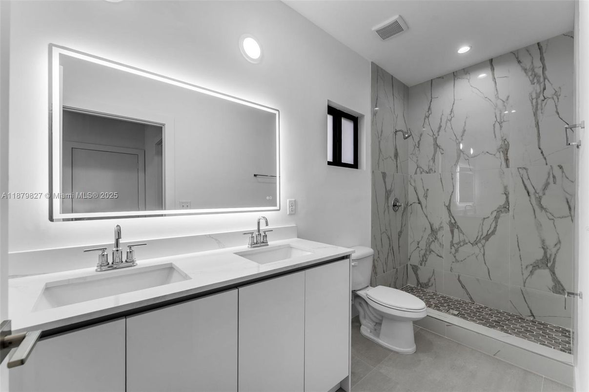 Bathroom, Dual Sink Vanities, Interior, Marble Walls, Recessed Lighting