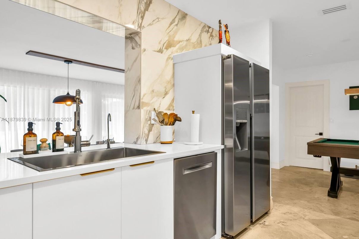 Interior, Kitchen, Marble Walls, Pendant Lights, Stainless Steel Appliances