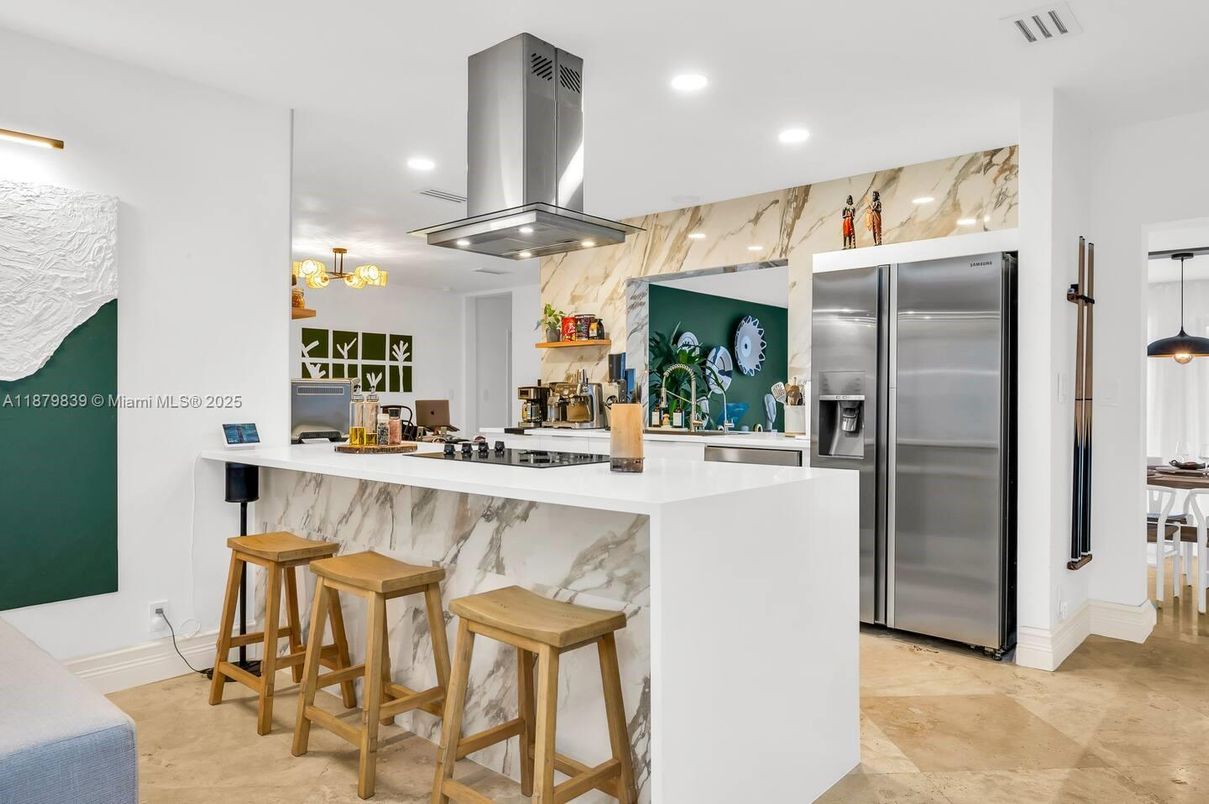 Interior, Kitchen, Marble Walls, Pendant Lights, Recessed Lighting, Stainless Steel Appliances