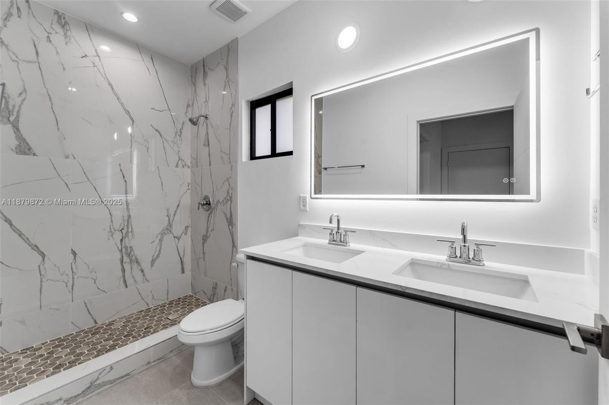 Bathroom, Dual Sink Vanities, Interior, Marble Walls, Recessed Lighting