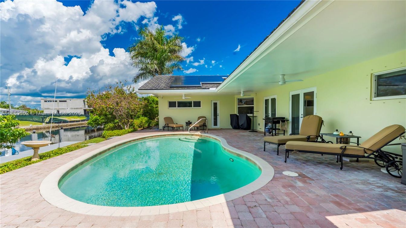 Exterior, Pool, Solar Panels