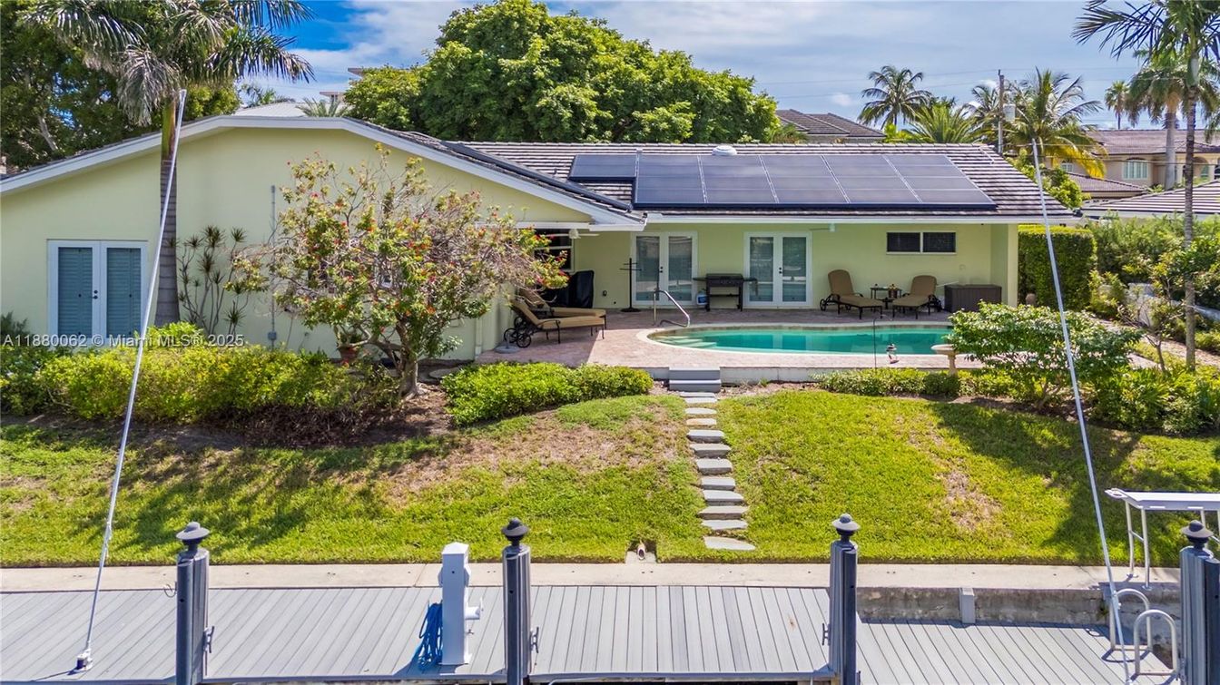 Exterior, Pool, Solar Panels
