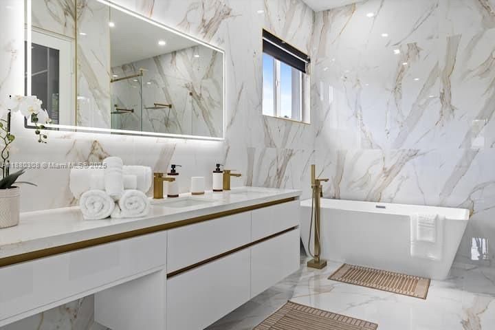 Bathroom, Dual Sink Vanities, Free Standing Baths, Interior, Marble, Marble Walls, Recessed Lighting