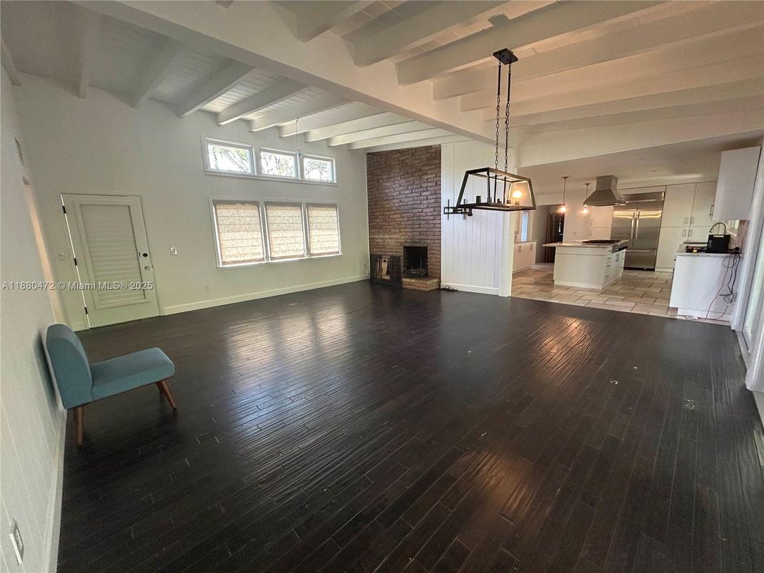 Empty room, Fireplace, Interior, Kitchen, Pendant Lights, Stone Walls, Wood Texture Flooring