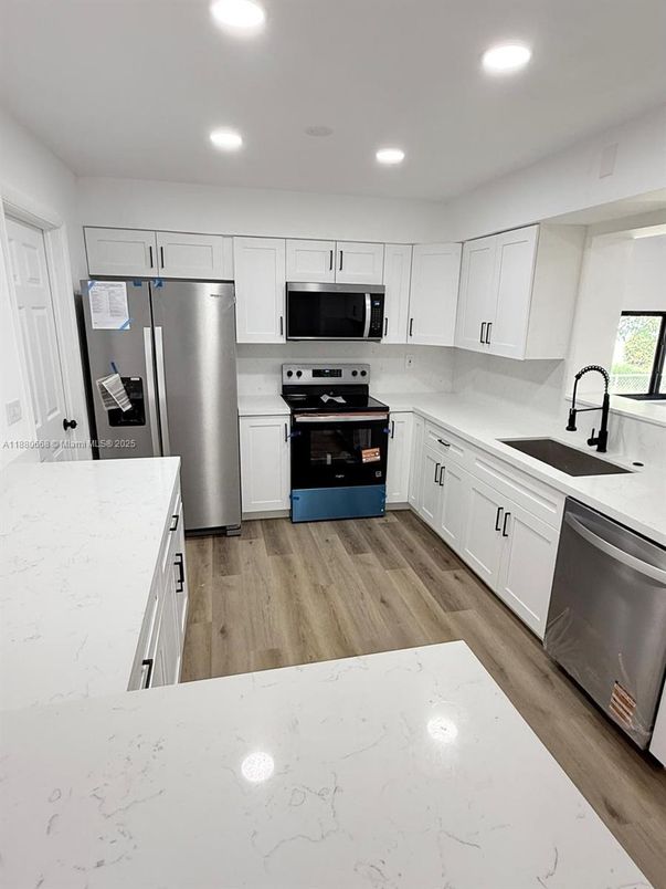 Interior, Kitchen, Recessed Lighting, Stainless Steel Appliances, Wood Texture Flooring