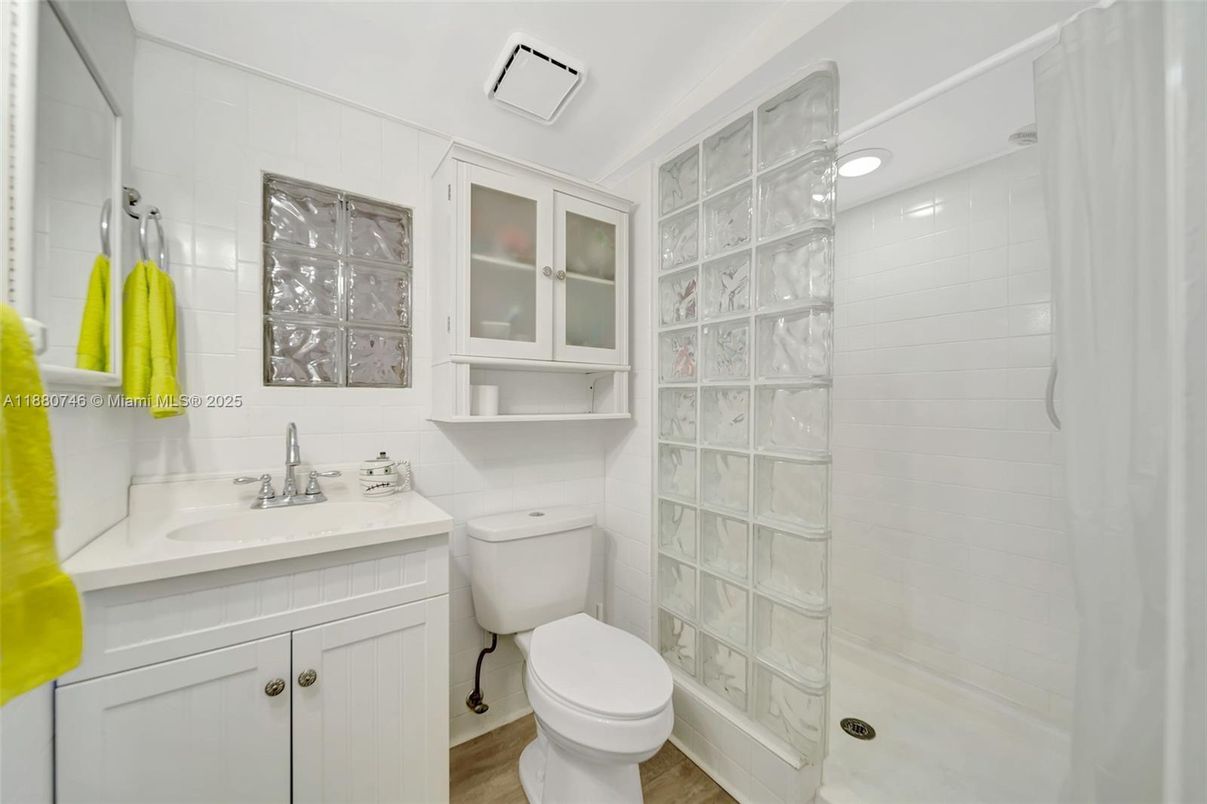 Bathroom, Glass Shower, Interior, Recessed Lighting, Wood Texture Flooring