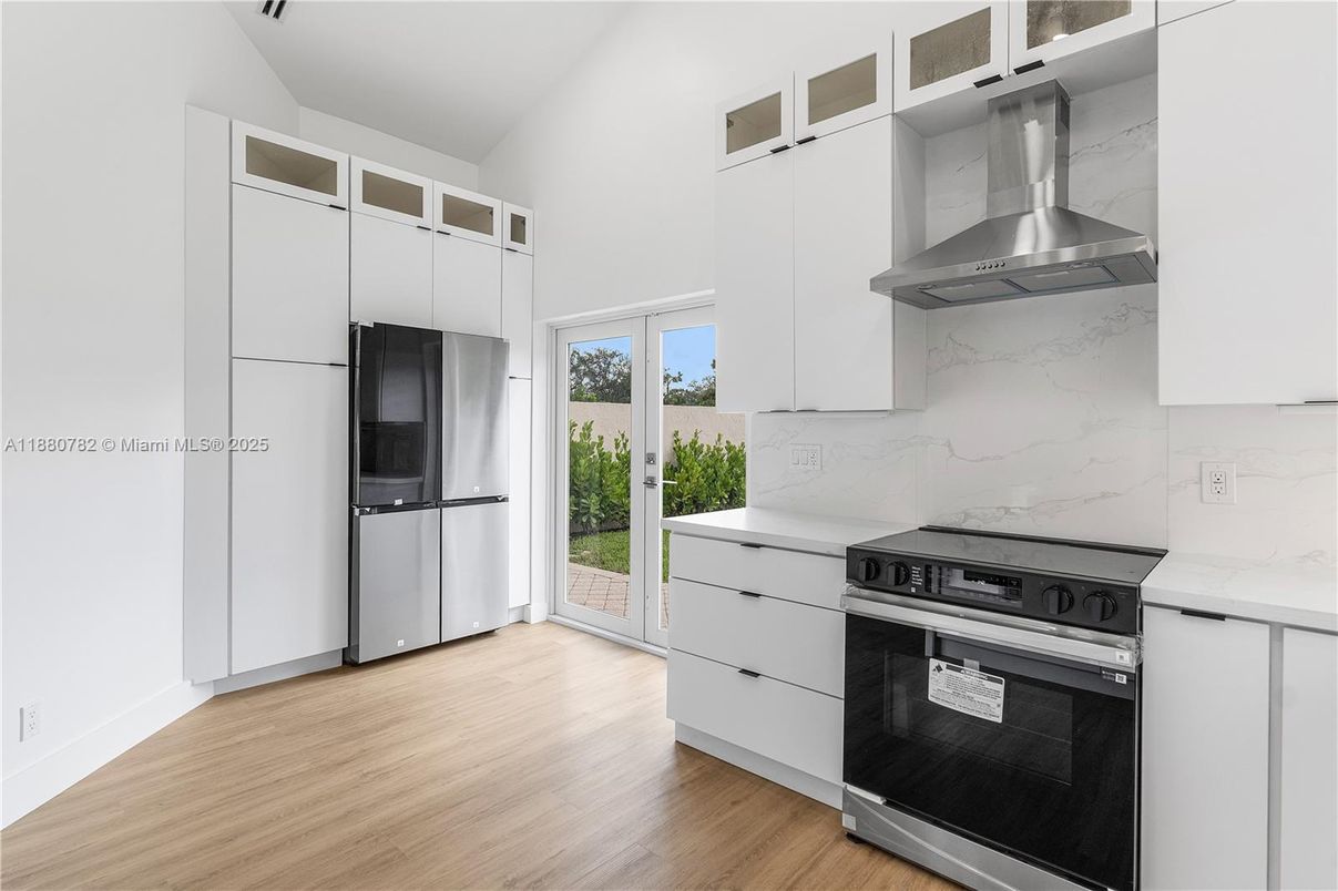 Interior, Kitchen, Marble Walls, Stainless Steel Appliances, Wood Texture Flooring