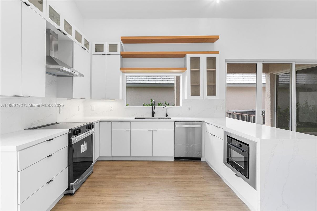 Interior, Kitchen, Marble Walls, Stainless Steel Appliances, Wood Texture Flooring