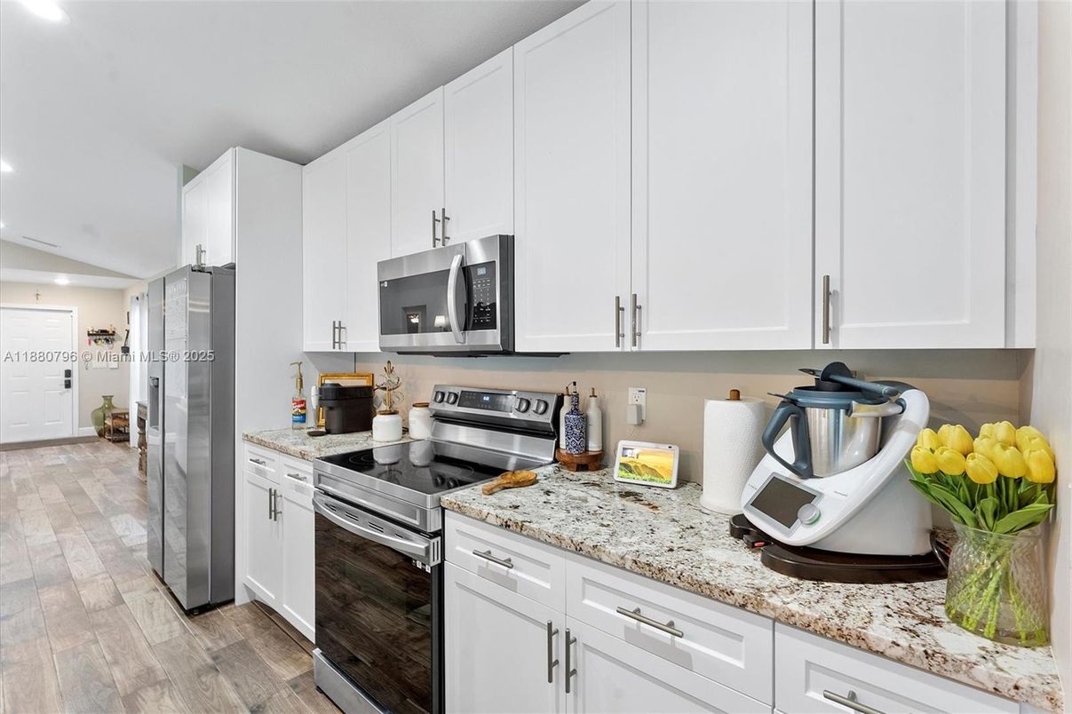 Interior, Kitchen, Recessed Lighting, Stainless Steel Appliances, Wood Texture Flooring