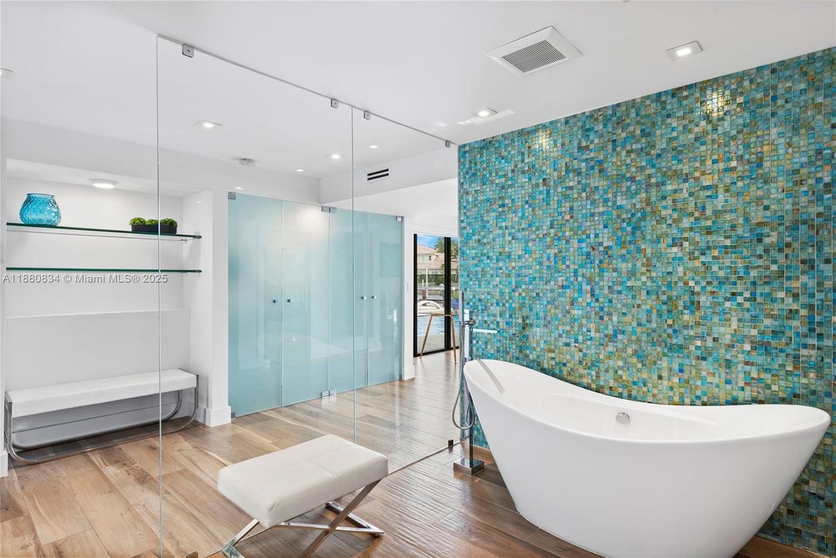 Bathroom, Free Standing Baths, Glass Shower, Interior, Recessed Lighting, Wood Texture Flooring