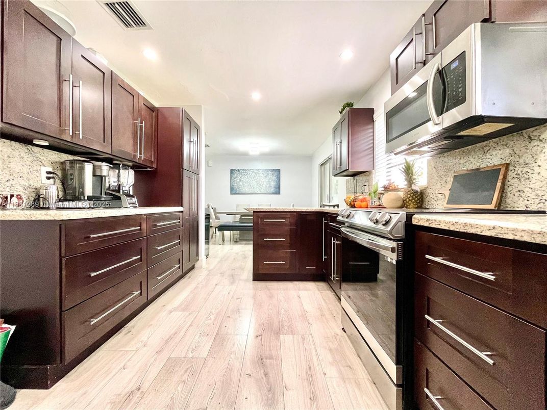 Interior, Kitchen, Recessed Lighting, Stainless Steel Appliances, Wood Texture Flooring