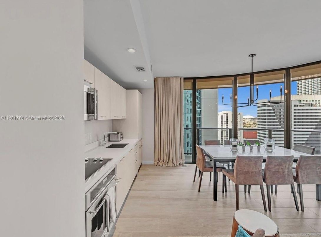 Dining room, Interior, Kitchen, Pendant Lights, Recessed Lighting, Stainless Steel Appliances, Water, Wood Texture Flooring