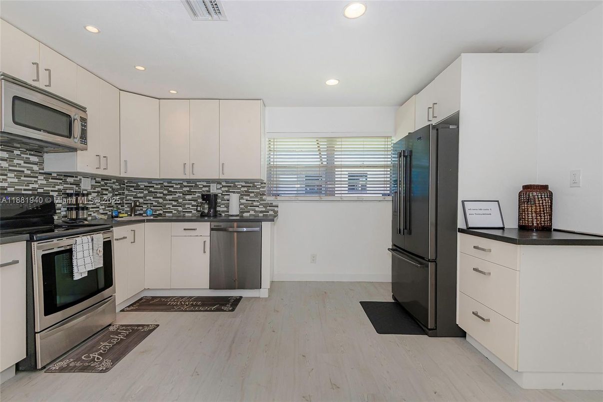 Interior, Kitchen, Recessed Lighting, Stainless Steel Appliances, Wood Texture Flooring