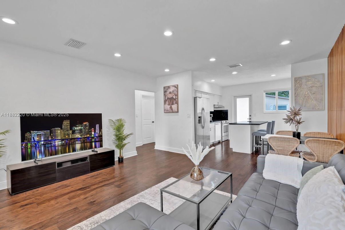 Dining room, Interior, Kitchen, Living room, Recessed Lighting, Stainless Steel Appliances, Wood Texture Flooring