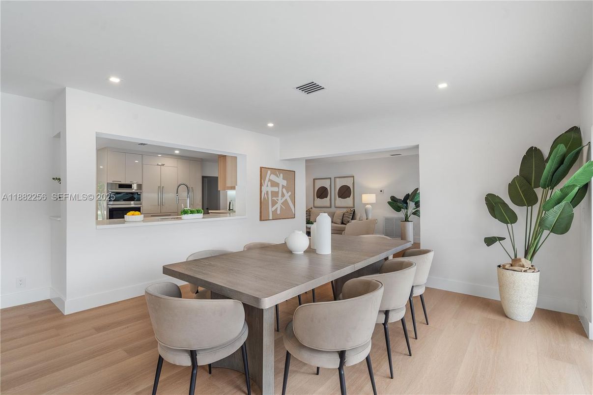 Dining room, Interior, Kitchen, Living room, Recessed Lighting, Stainless Steel Appliances, Wood Texture Flooring