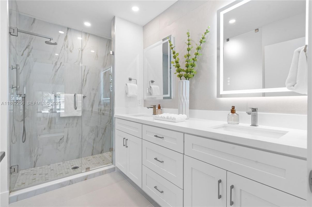 Bathroom, Dual Sink Vanities, Glass Shower, Interior, Marble Walls, Recessed Lighting