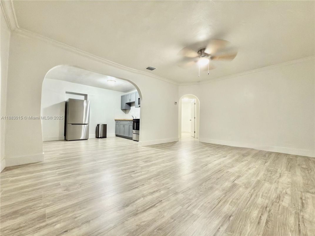 Empty room, Interior, Kitchen, Stainless Steel Appliances, Wood Texture Flooring