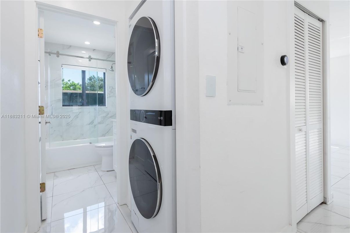 Bathroom, Glass Shower, Interior, Marble, Marble Walls, Recessed Lighting, Utility Closets, Washer