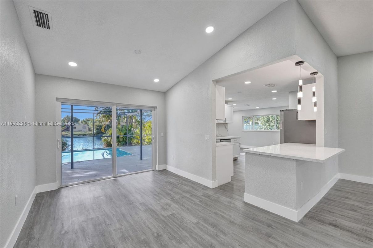Empty room, Interior, Kitchen, Pendant Lights, Recessed Lighting, Water, Wood Texture Flooring