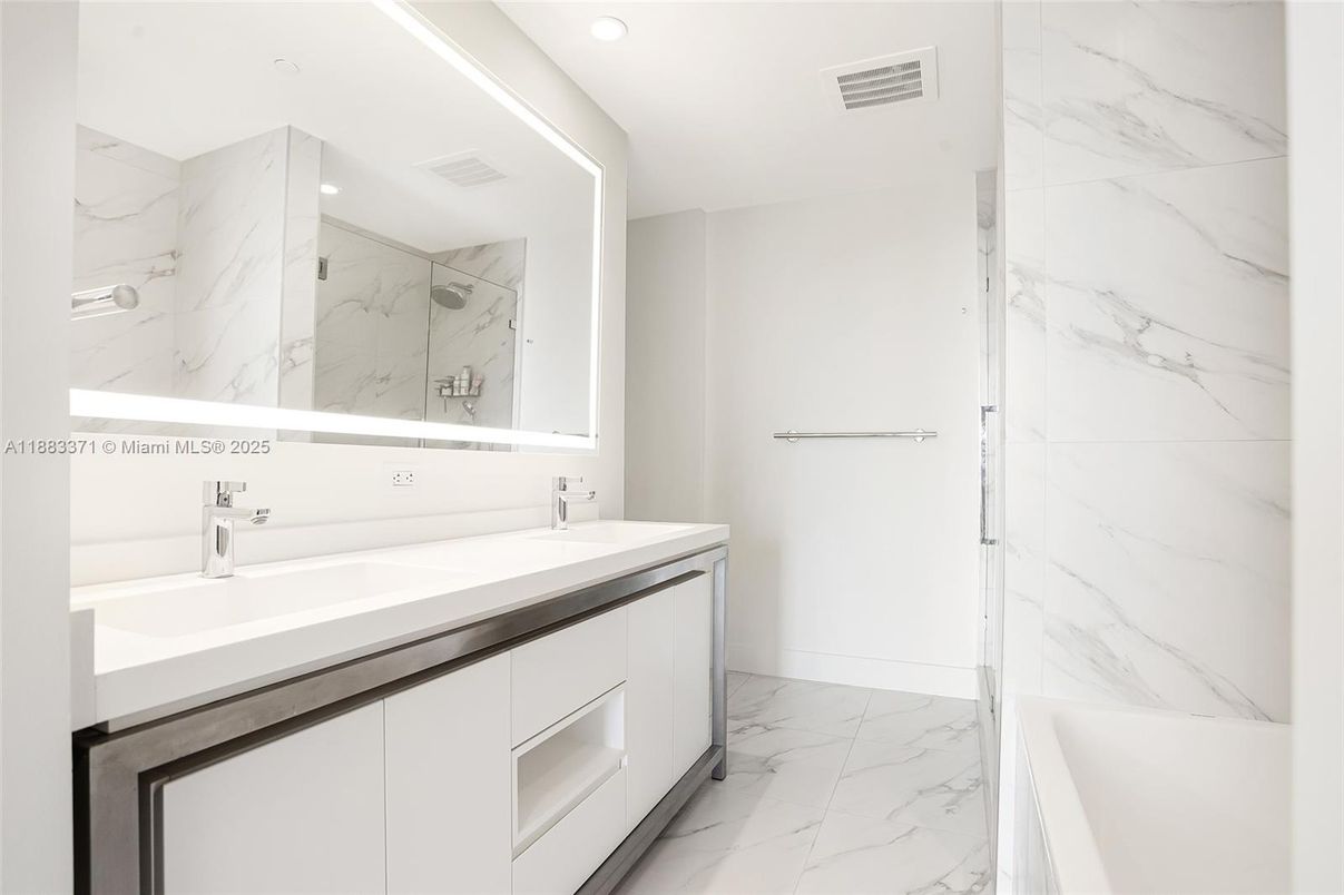 Bathroom, Dual Sink Vanities, Interior, Marble, Marble Walls, Recessed Lighting