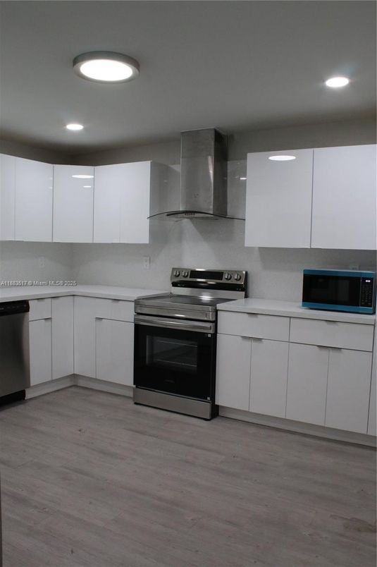 Interior, Kitchen, Recessed Lighting, Stainless Steel Appliances, Wood Texture Flooring
