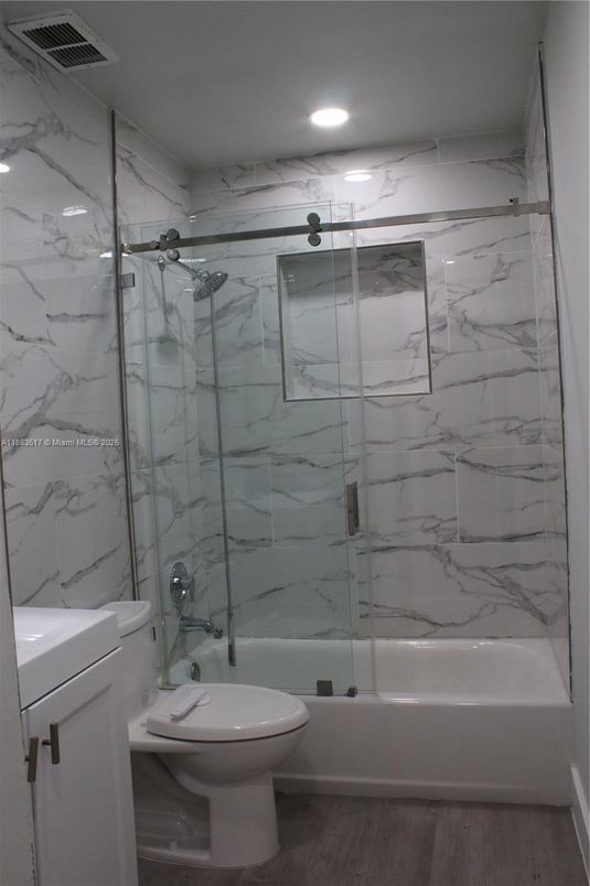 Bathroom, Glass Shower, Interior, Marble Walls, Recessed Lighting, Wood Texture Flooring