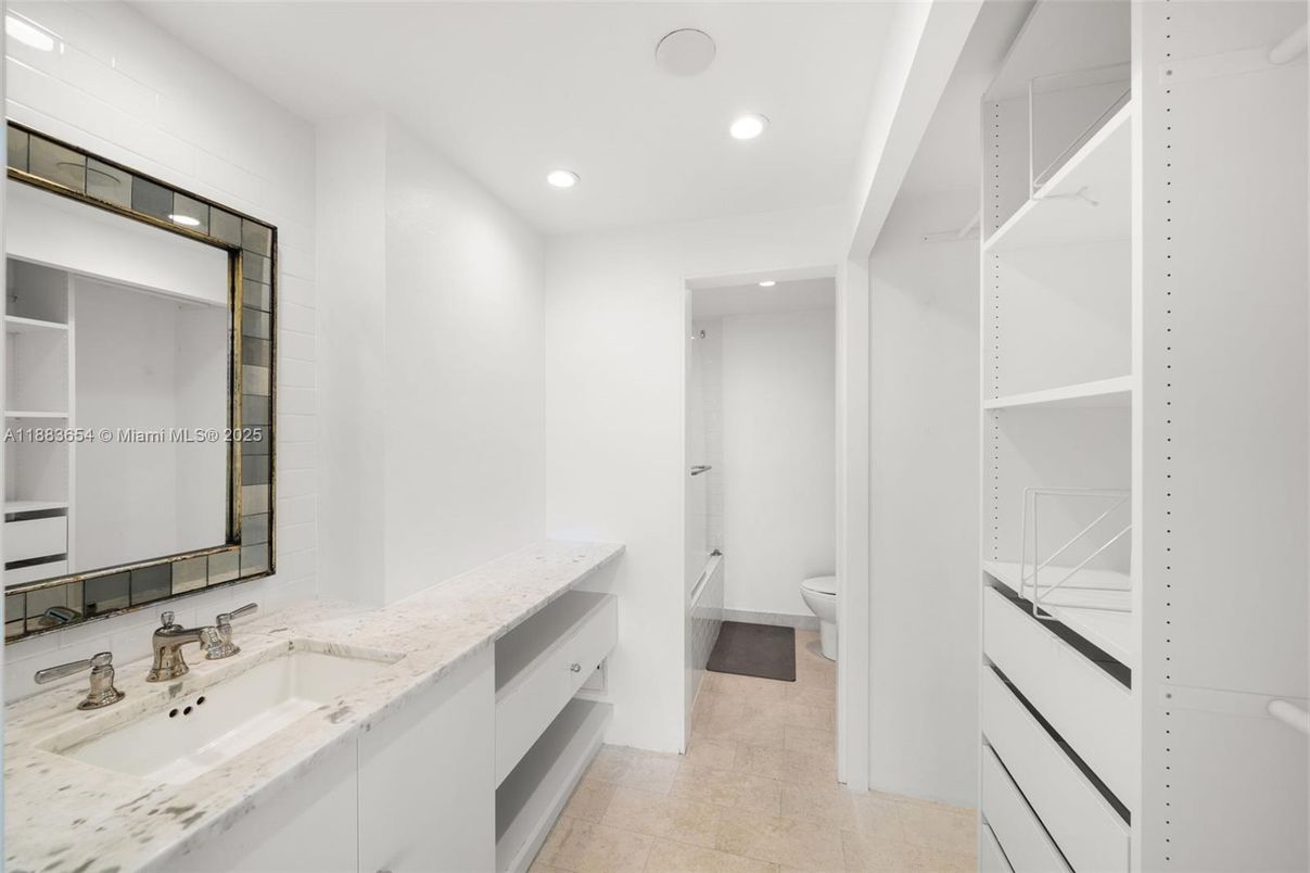 Bathroom, Dual Sink Vanities, Interior, Recessed Lighting, Walk-in Closets
