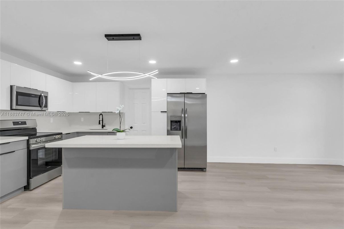 Interior, Kitchen, Pendant Lights, Recessed Lighting, Stainless Steel Appliances, Wood Texture Flooring