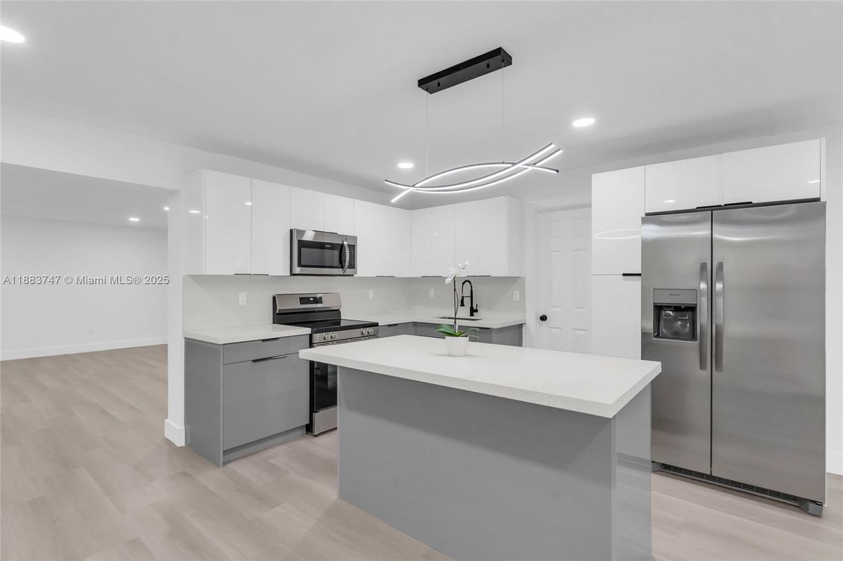 Interior, Kitchen, Pendant Lights, Recessed Lighting, Stainless Steel Appliances, Wood Texture Flooring