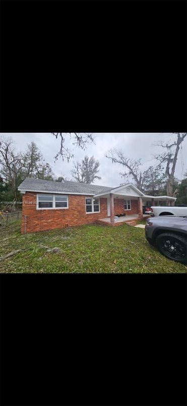 Backyard, Exterior, Facade, Brick Facade, None
