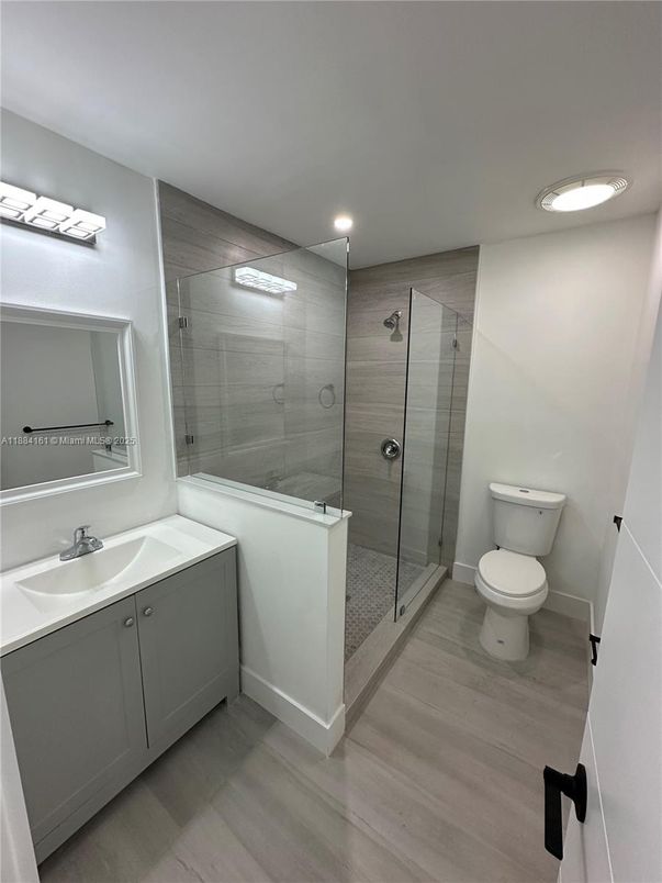Bathroom, Glass Shower, Interior, Recessed Lighting, Wood Texture Flooring