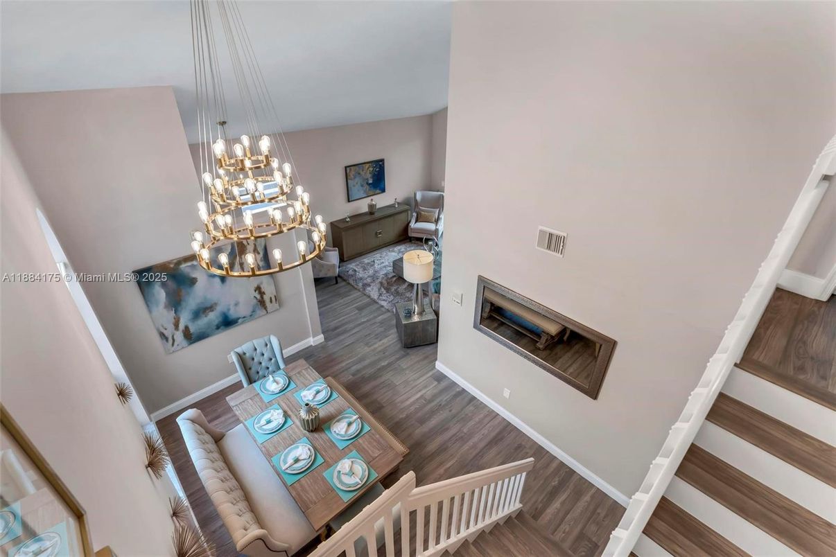 Chandelier, Dining room, Fireplace, Interior, Pendant Lights, Wood Texture Flooring