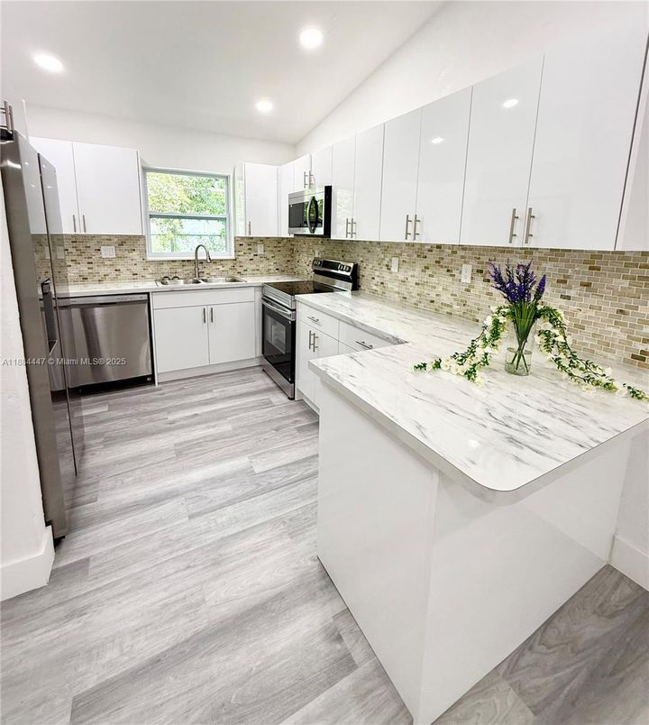 Interior, Kitchen, Recessed Lighting, Stainless Steel Appliances, Wood Texture Flooring