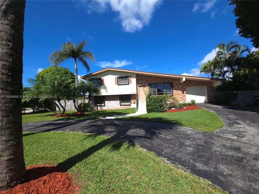 Attached, Exterior, Facade, Brick Facade, Modern