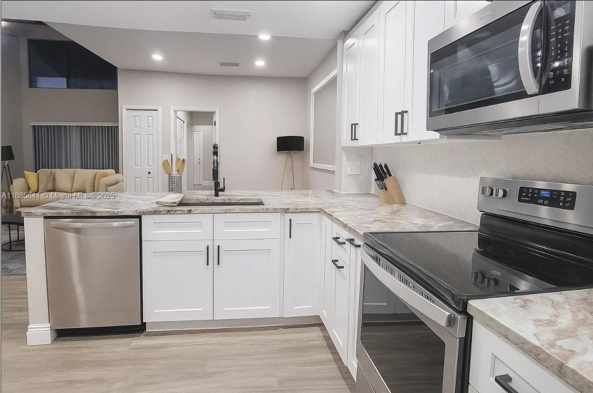 Interior, Kitchen, Recessed Lighting, Stainless Steel Appliances, Wood Texture Flooring