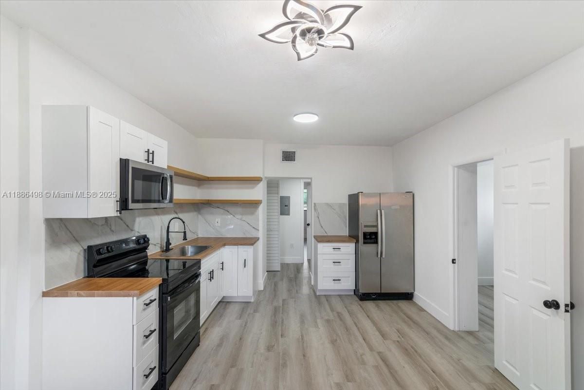 Interior, Kitchen, Marble Walls, Recessed Lighting, Wood Texture Flooring