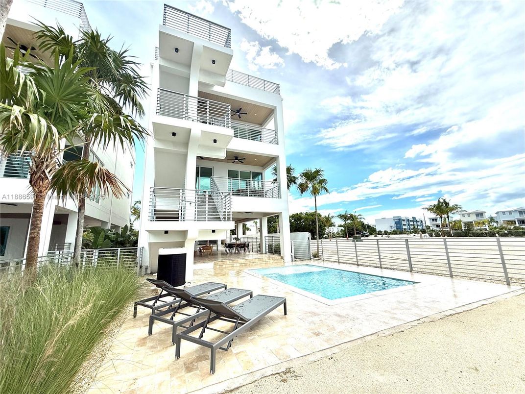 Exterior, Facade, Pool, Condo Building