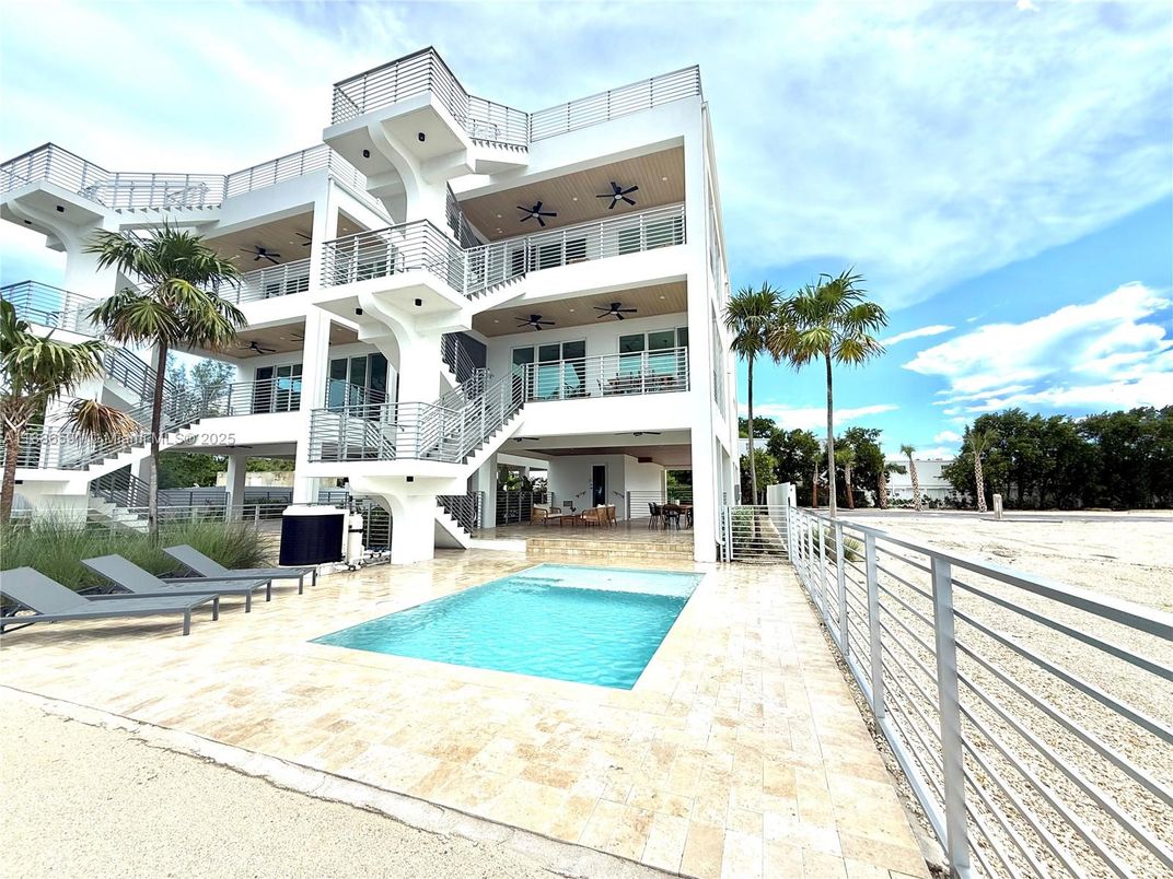 Exterior, Facade, Pool, Condo Building