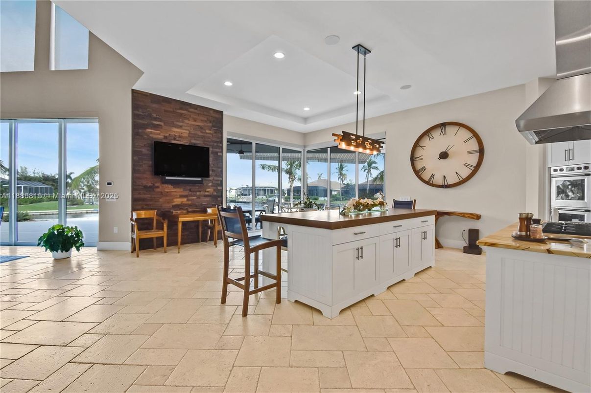 Dining room, Interior, Kitchen, Pendant Lights, Recessed Lighting, Stainless Steel Appliances, Wooden Walls
