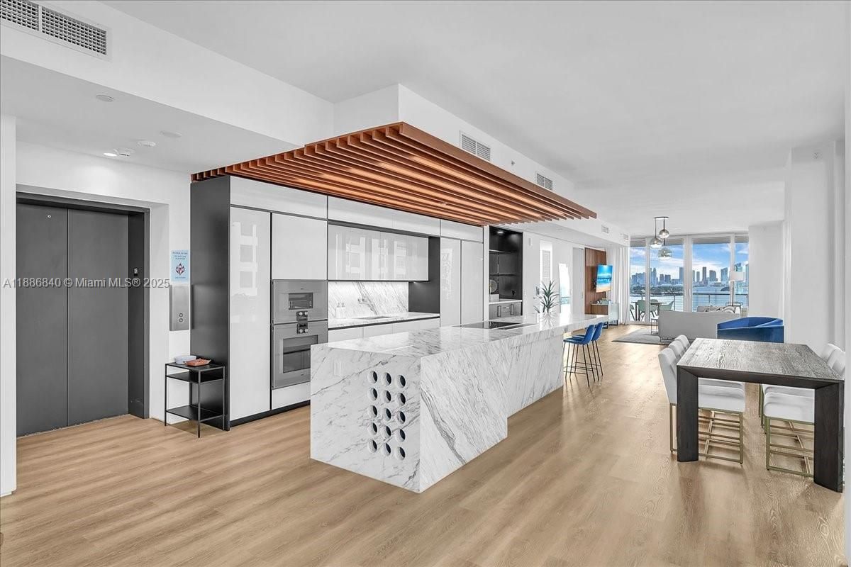 Interior, Kitchen, Pendant Lights, Recessed Lighting, Stainless Steel Appliances, Water, Wood Texture Flooring