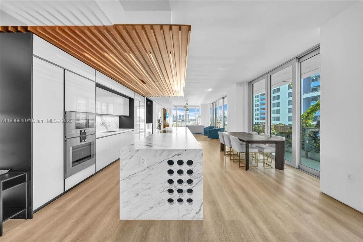 Dining room, Interior, Kitchen, Recessed Lighting, Stainless Steel Appliances, Wooden Ceilings, Wood Texture Flooring
