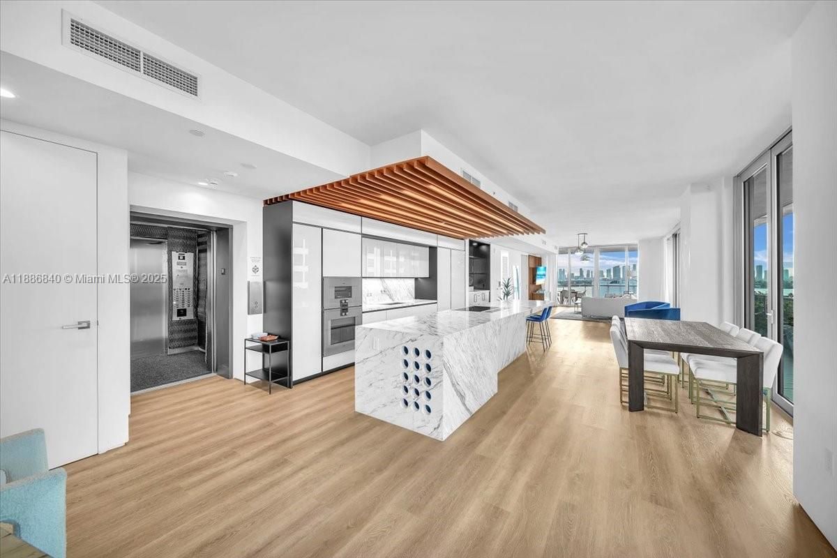 Dining room, Interior, Kitchen, Living room, Pendant Lights, Recessed Lighting, Stainless Steel Appliances, Wood Texture Flooring