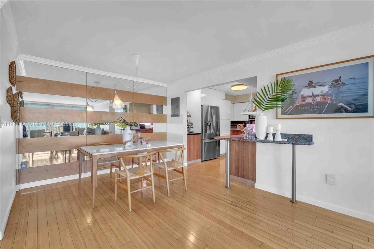 Dining room, Interior, Kitchen, Pendant Lights, Stainless Steel Appliances, Wood Texture Flooring