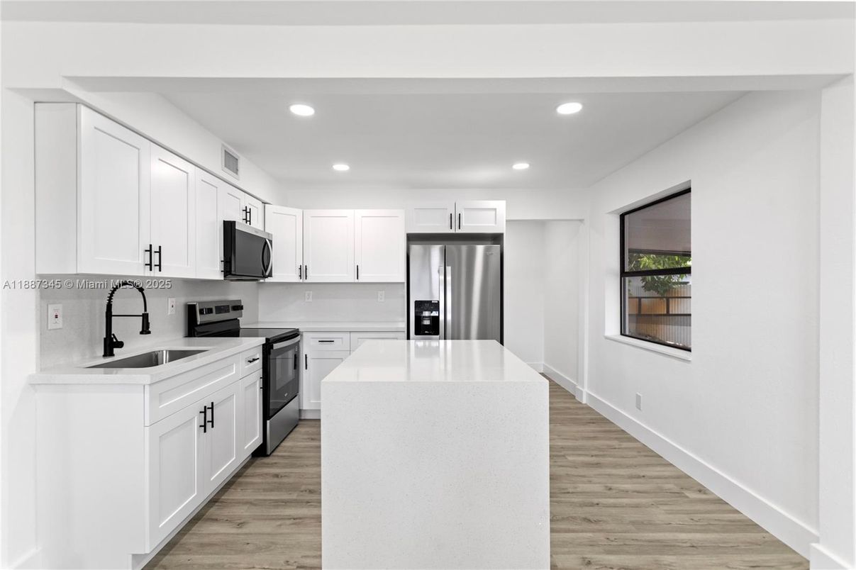 Interior, Kitchen, Recessed Lighting, Stainless Steel Appliances, Wood Texture Flooring