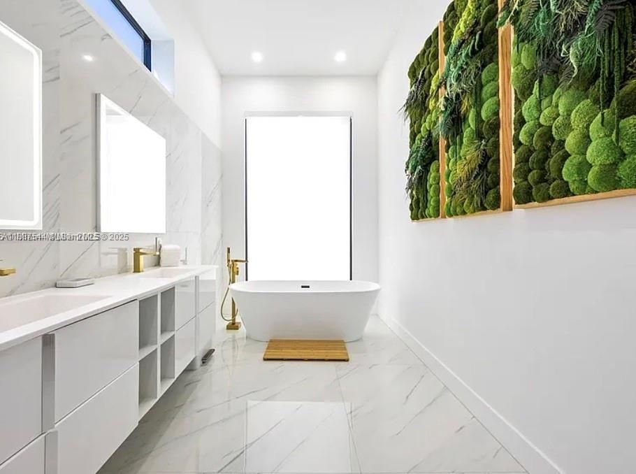 Bathroom, Dual Sink Vanities, Free Standing Baths, Interior, Marble, Marble Walls, Recessed Lighting