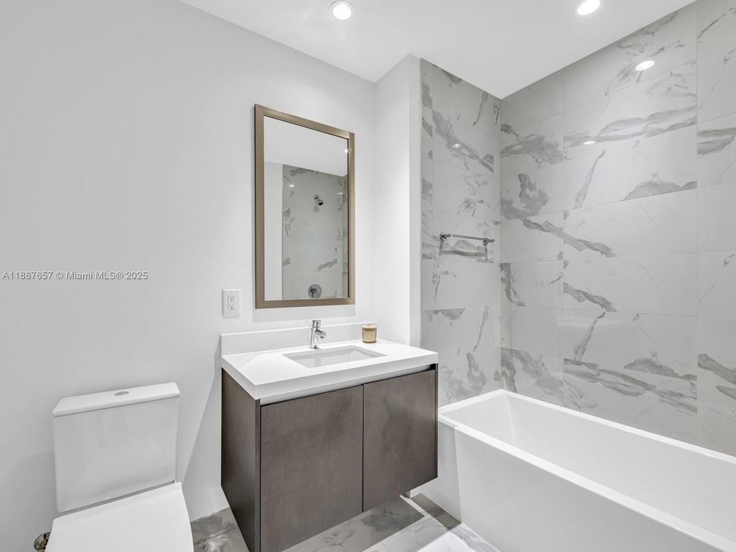 Bathroom, Free Standing Baths, Interior, Marble, Marble Walls, Recessed Lighting