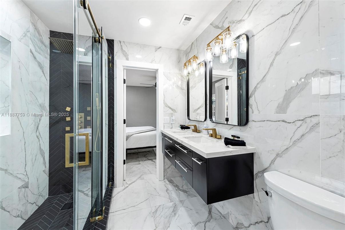 Bathroom, Bedroom, Dual Sink Vanities, Glass Shower, Interior, Marble, Marble Walls, Recessed Lighting