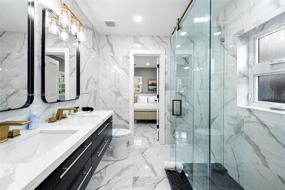 Bathroom, Bedroom, Dual Sink Vanities, Glass Shower, Interior, Marble, Marble Walls, Recessed Lighting
