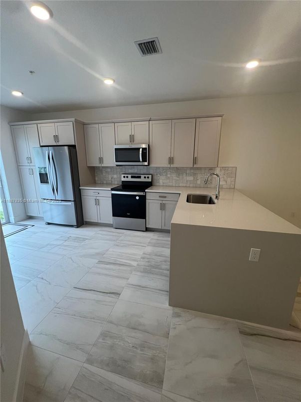 Interior, Kitchen, Marble, Recessed Lighting, Stainless Steel Appliances