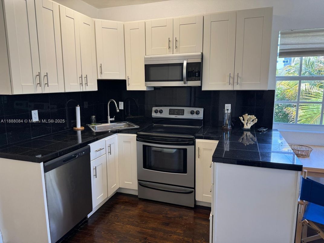 Interior, Kitchen, Tile Countertops, Wood Texture Flooring